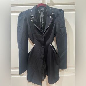 Adorable jacket with side cut outs. Rhinestones asking edges